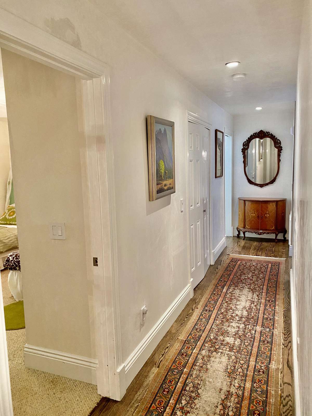 Main hallway looking toward kitchen from bedrooms 3 & 4