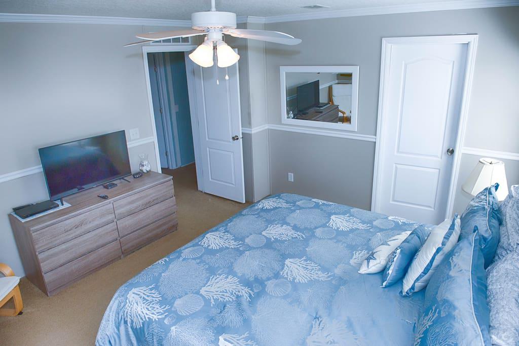 Master Bedroom with King Size Bed, ceiling fan, flat screen tv, dvd player, & WOW Cable