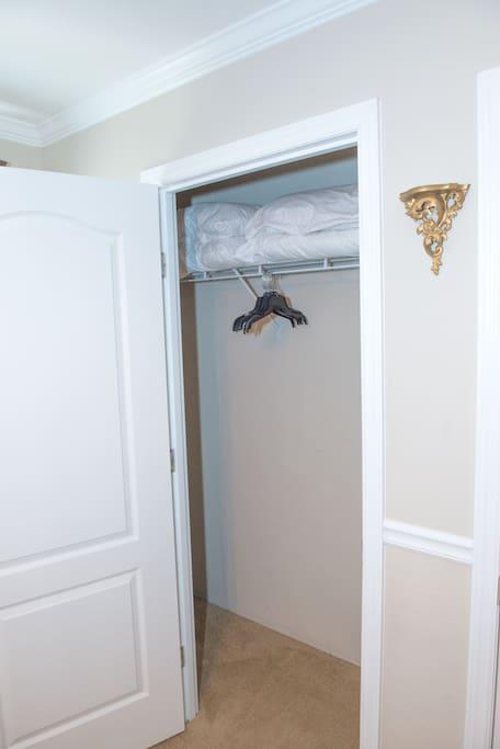 Extra Pillows and hangers in Master Closet