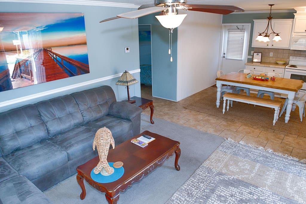 Den with Large Flat Panel TV w/ WOW Cable and DVD Player