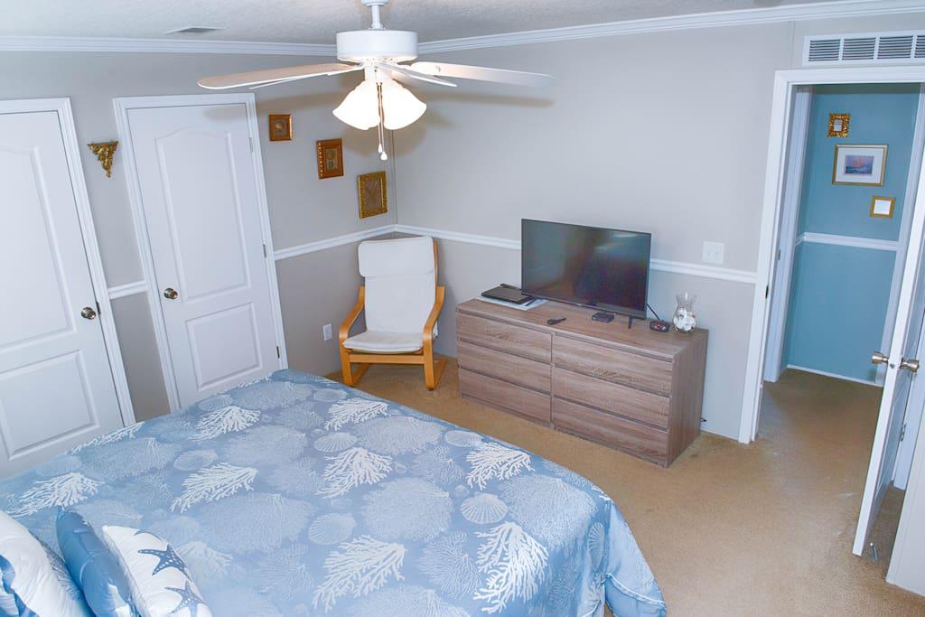 Master Bedroom with King Size Bed, ceiling fan, flat screen tv, dvd player, & WOW Cable