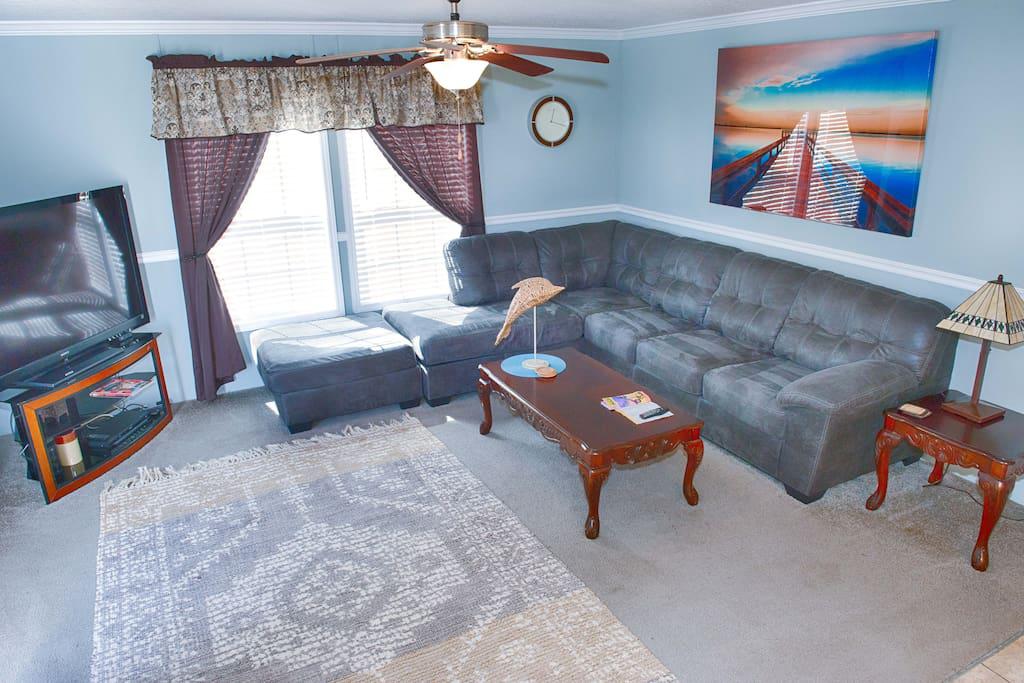 Den with Large Flat Panel TV w/ WOW Cable and DVD Player