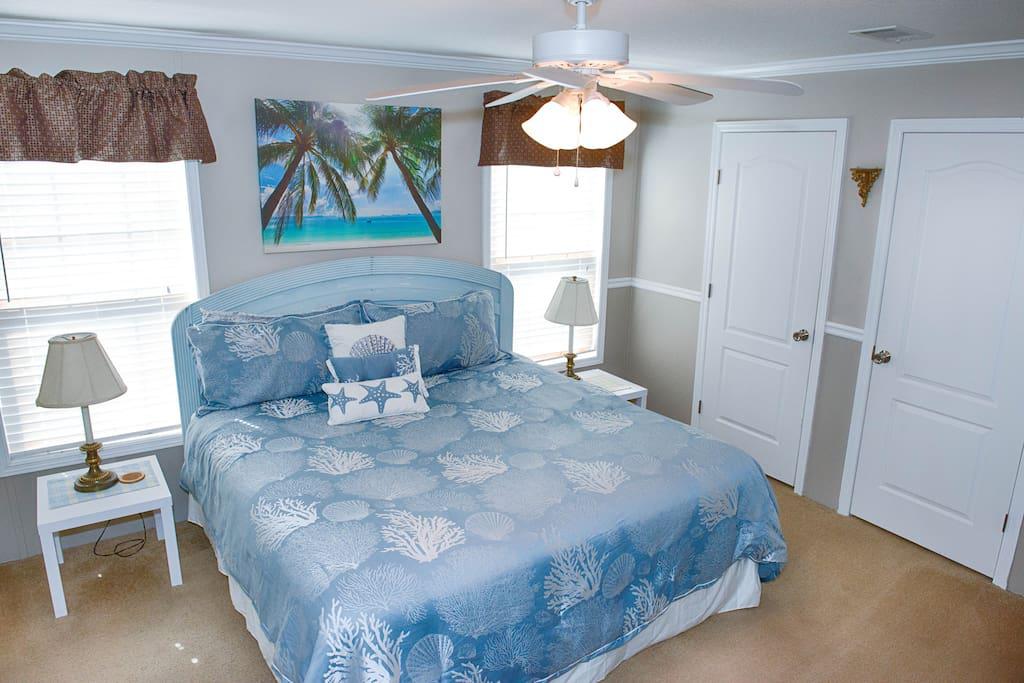 Master Bedroom with King Size Bed, ceiling fan, flat screen tv, dvd player, & WOW Cable