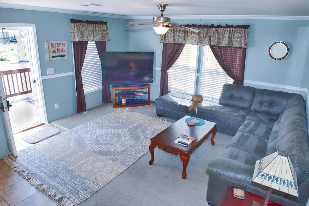 Den with Large Flat Panel TV w/ WOW Cable and DVD Player