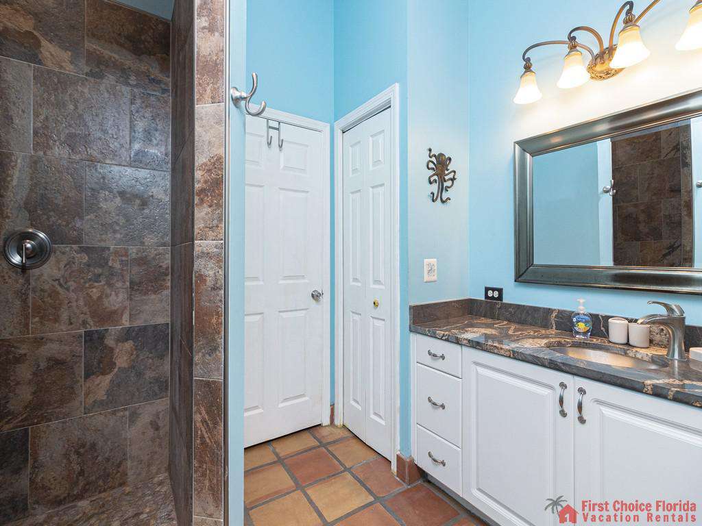 Coastal Hideaway Guest Bathroom with Shower and Vanity