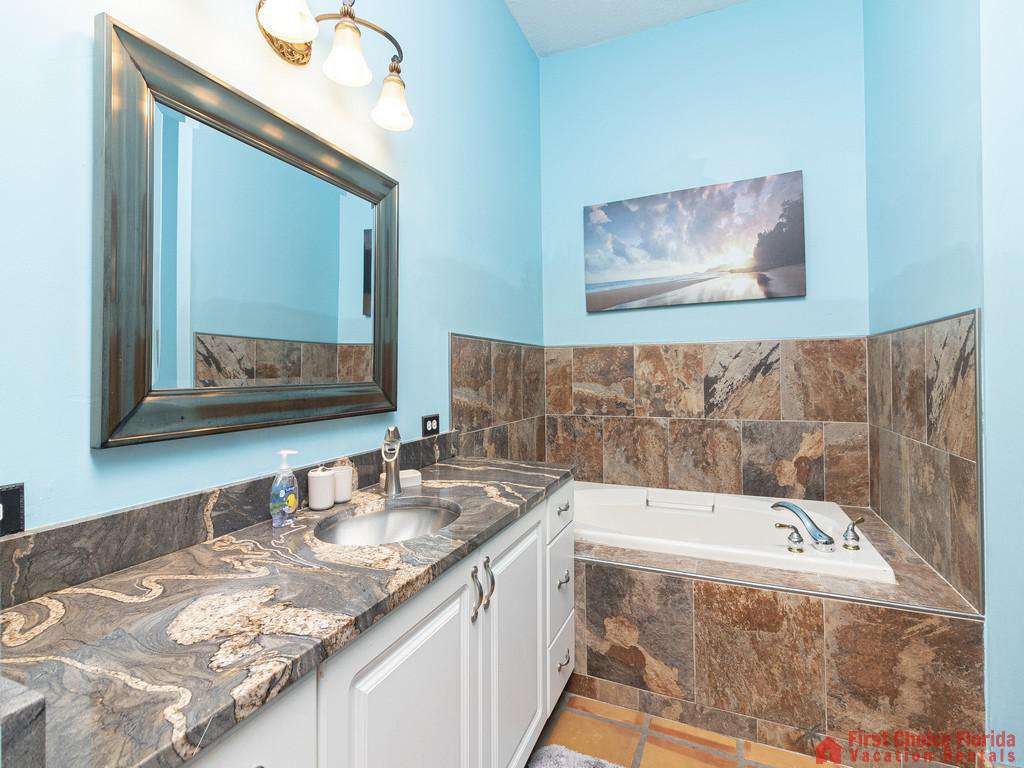 Coastal Hideaway Guest Bathroom with Tub