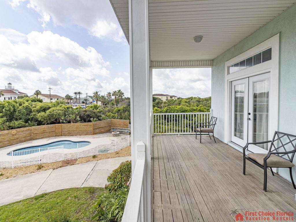 Coastal Hideaway Porch View of Pool