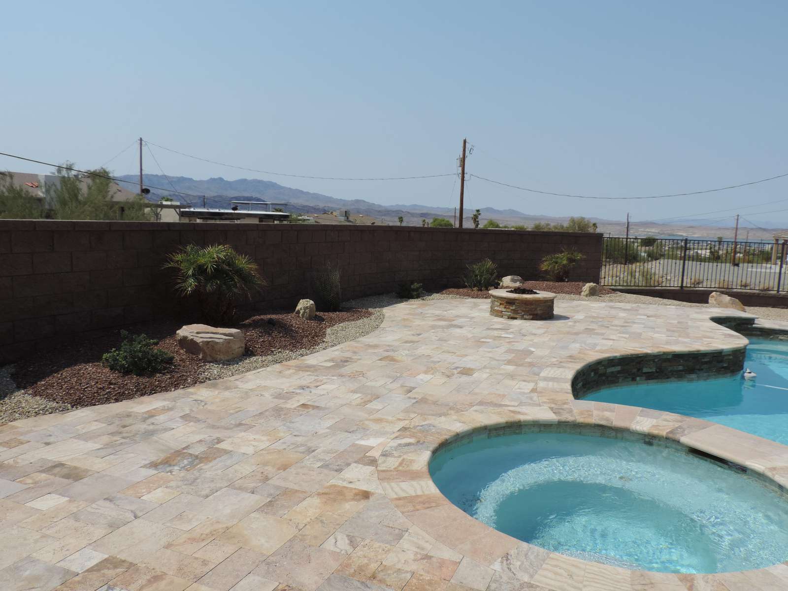 Tropical foliage surrounds the pool area