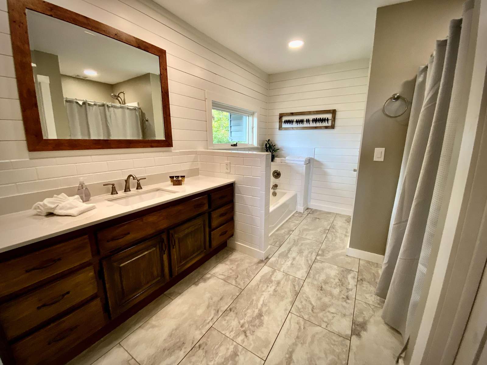 Master Bathroom offers a Shower and Separate Soaker Tub