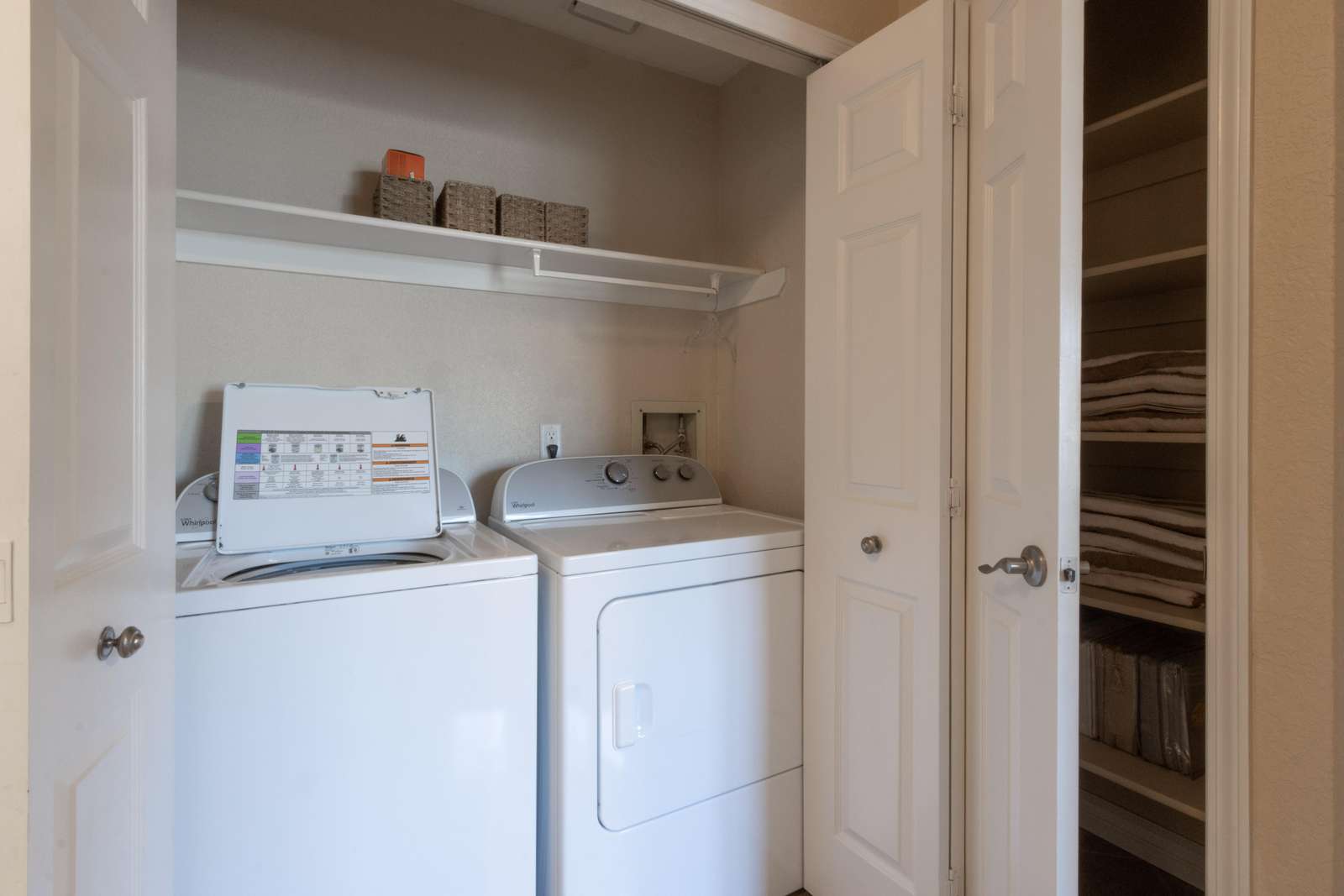 laundry closet with folded doors