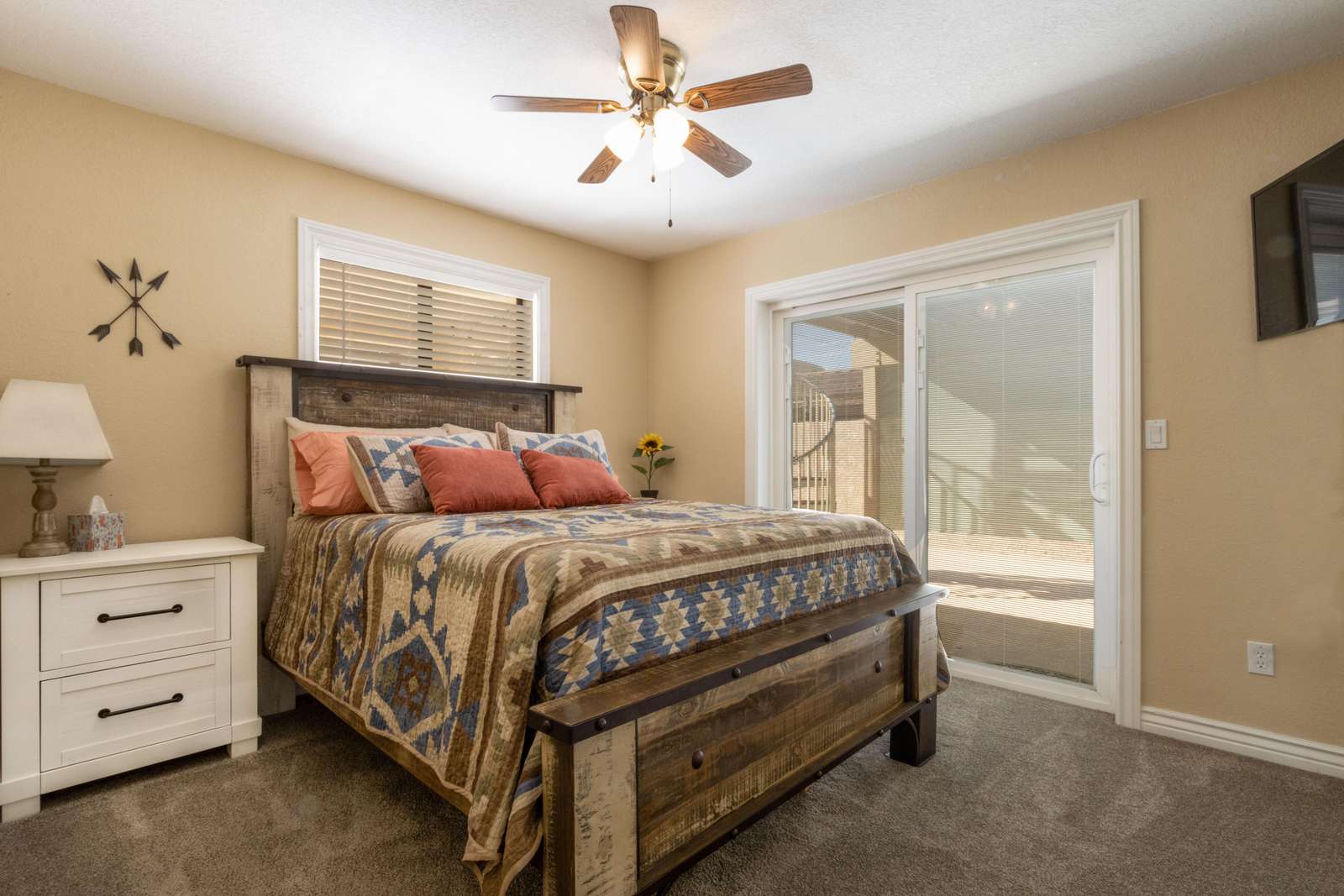 2nd bedroom off Den exits to private little covered patio area.