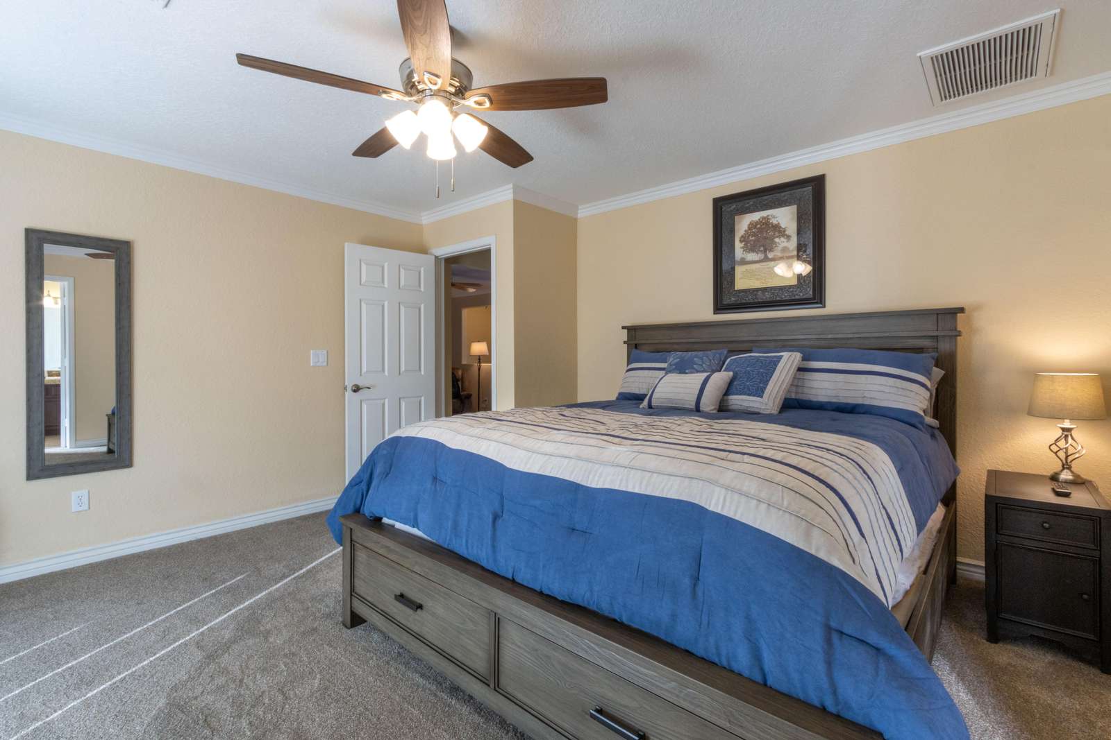 Master Bedroom split floor plan opposite side of common area.