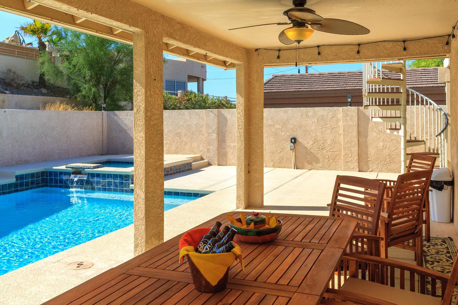 Back patio with pool and spa
