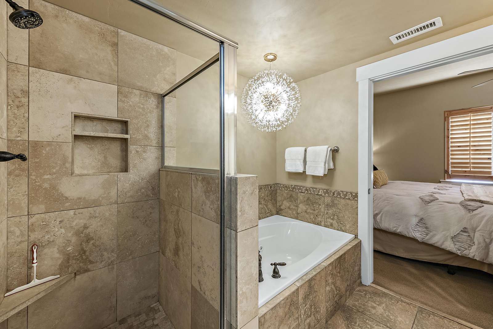 Master bathroom with large tub and shower