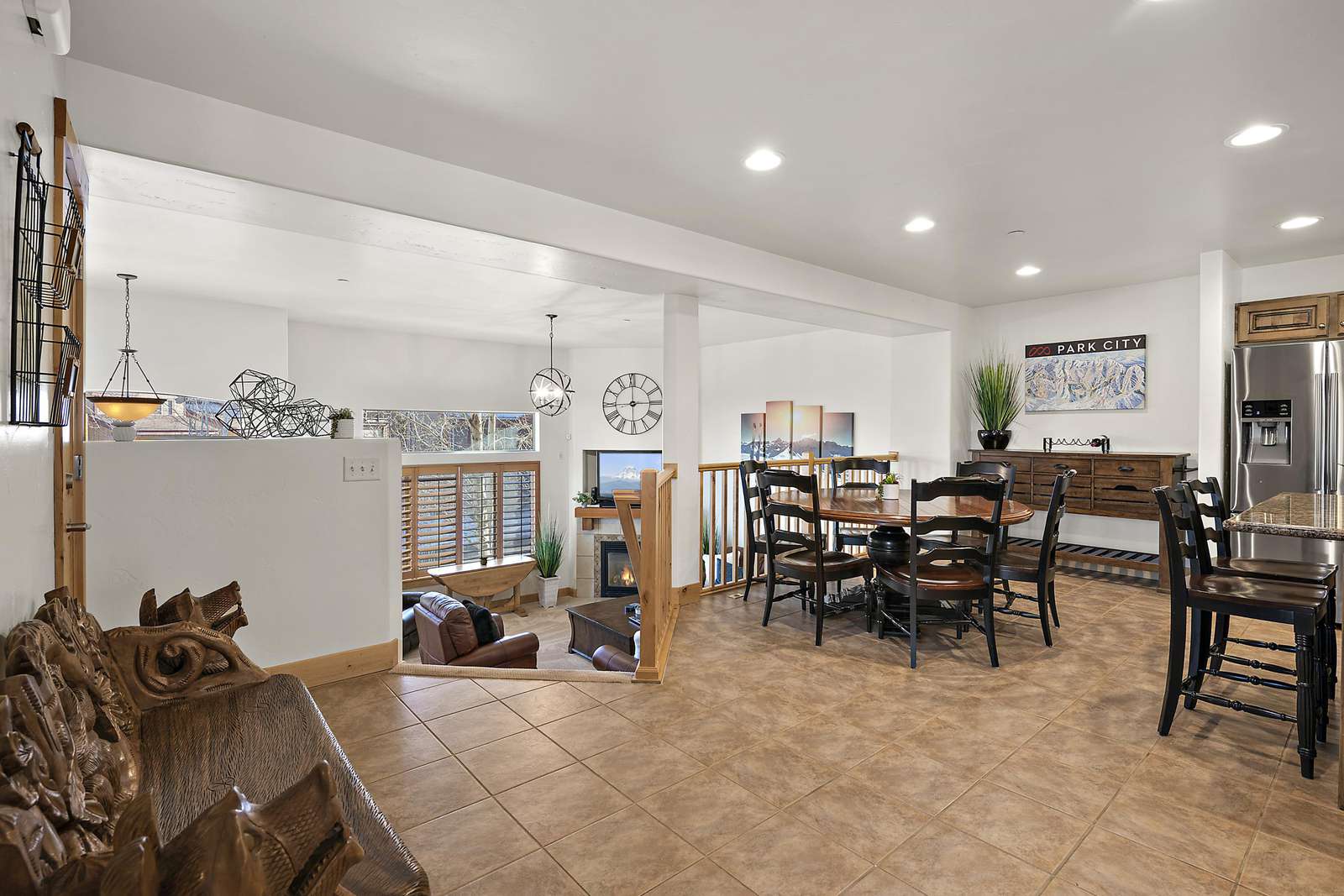 Kitchen and dining area next to living room