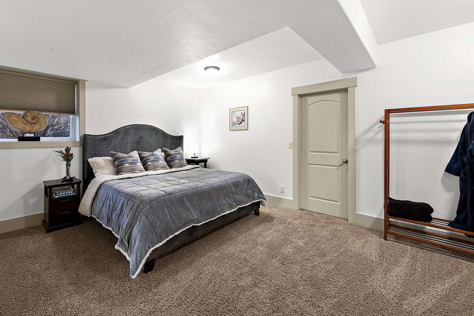 Spacious master bedroom with king bed
