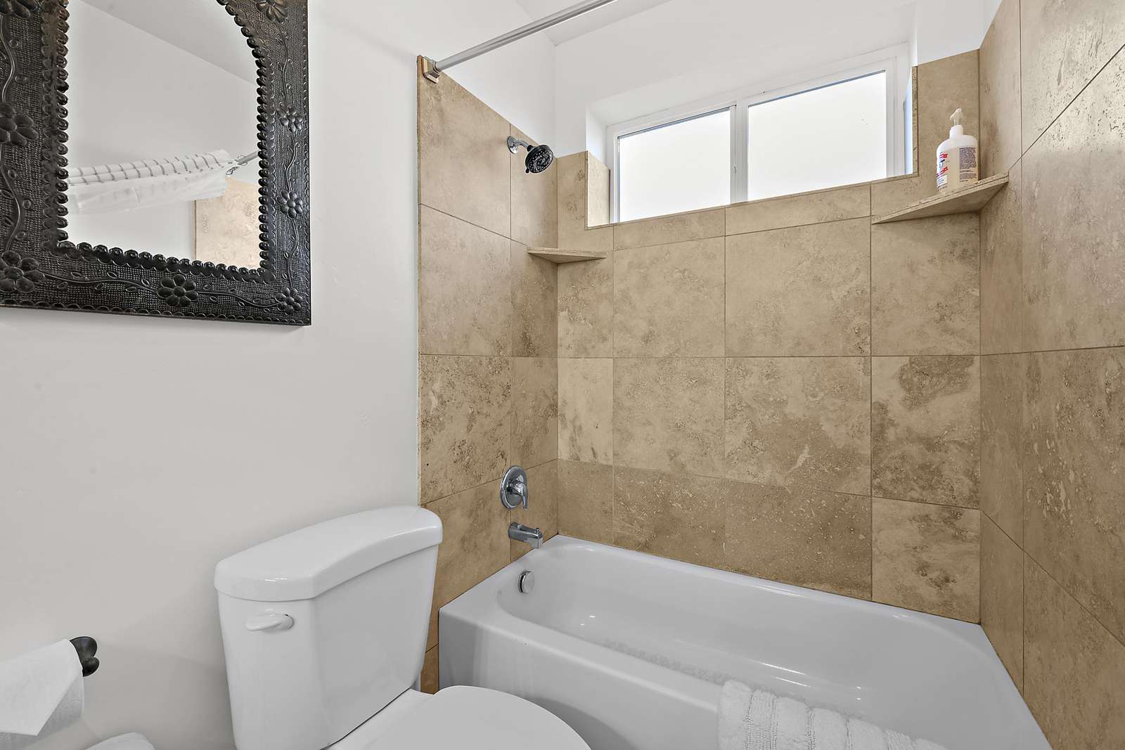 Shared Jack and Jill bathroom with shower/tub